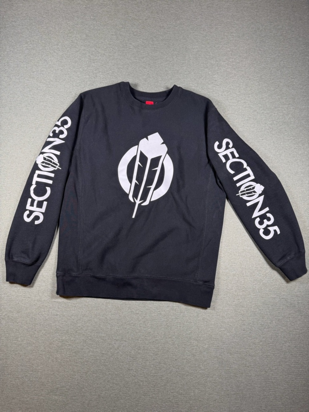 Black Crewneck Sweater with White Feather Logo